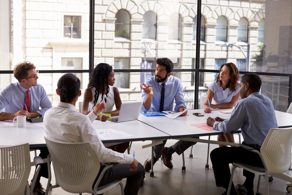 Corporate,Business,Team,And,Manager,In,A,Meeting,,Close,Up